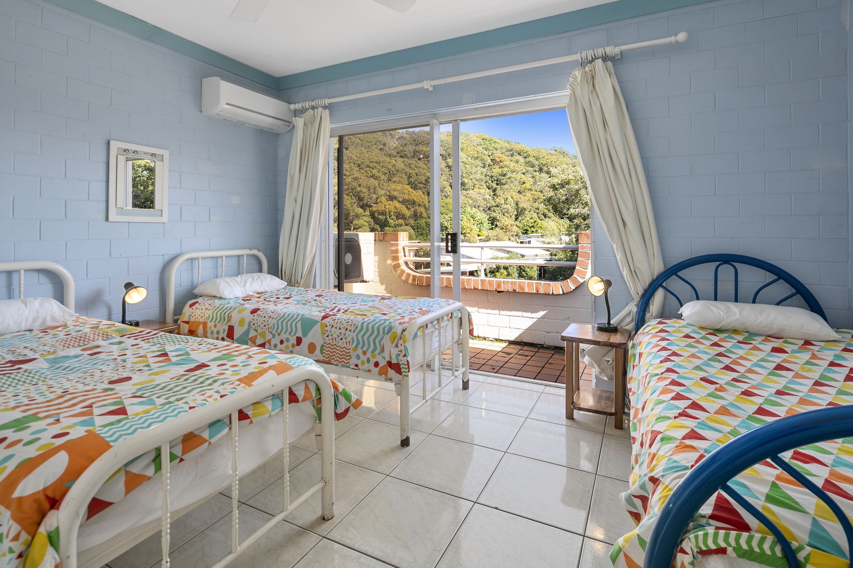 Two bedroom top level unit across the road from Home Beach.