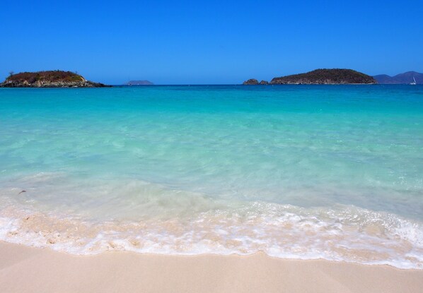 On the beach, sun-loungers, beach towels