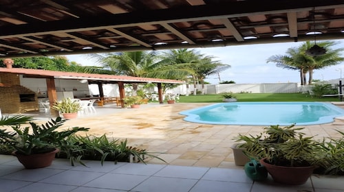 House in Serrambi, with pool, barbecue and less than 30 meters from the beach.