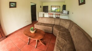 Family Condo, 2 Bedrooms, Mountain View | Living room | 32-inch LCD TV with cable channels, TV - Condos Vista Al Volcán (La Fortuna)