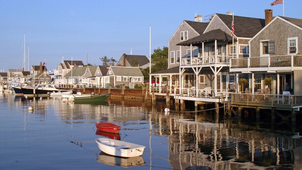 A waterfront property with multiple houses, docks, and boats. - The Folger House on historic Academy Hill, Nantucket (Nantucket)