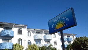 A hotel with a sign reading "West Beach Lagoon". - Scarborough Beach Escape NEW (Scarborough)