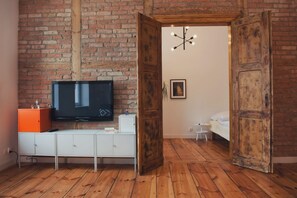 Apartamento conforto, 1 cama Queen e sofá-cama, para não fumantes, vista para a cidade | Parte interna