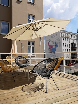 Apartamento design, 1 cama Queen e sofá-cama, para não fumantes, vista para o pátio | Parte interna