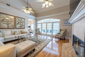 Smart TV, fireplace, books, stereo