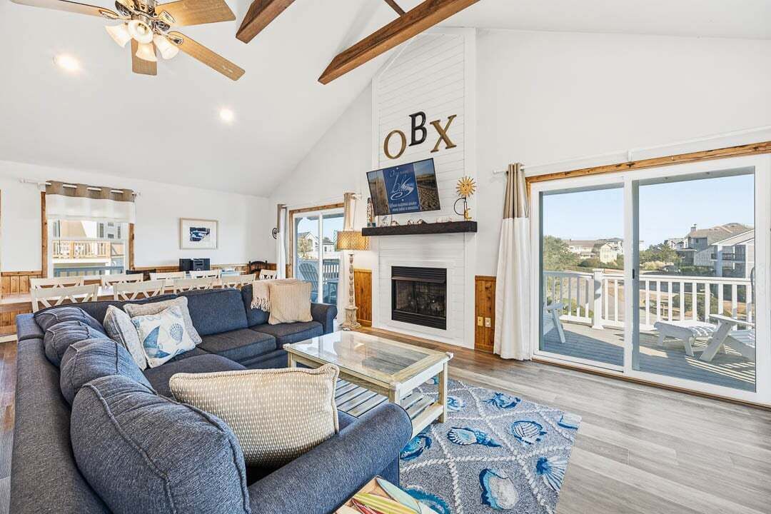 Top-Level Living Room with Deck Access