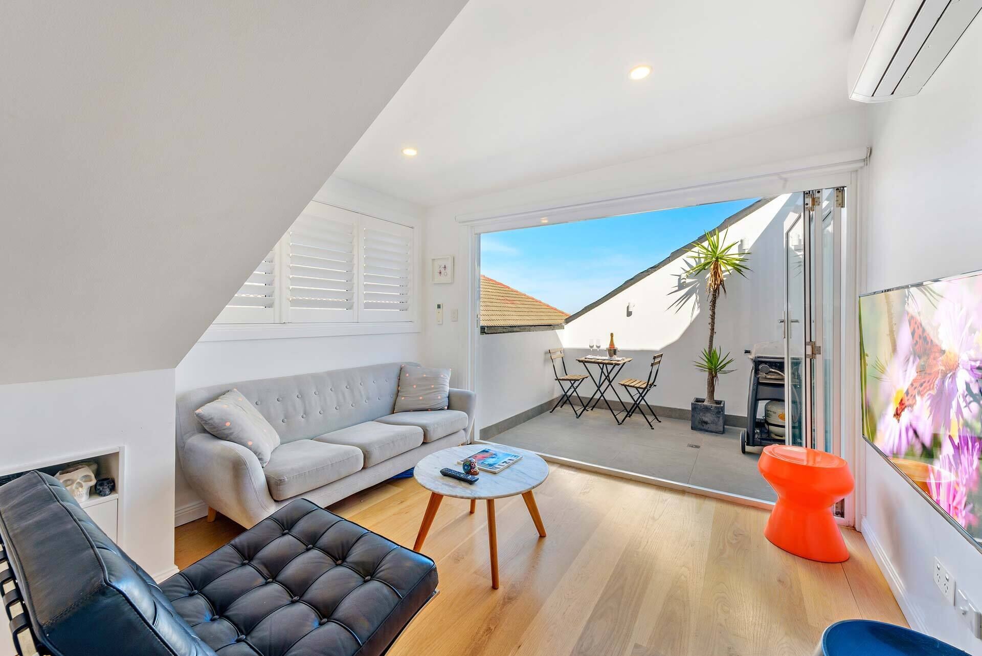 Upstairs sitting & bi-fold doors to balcony