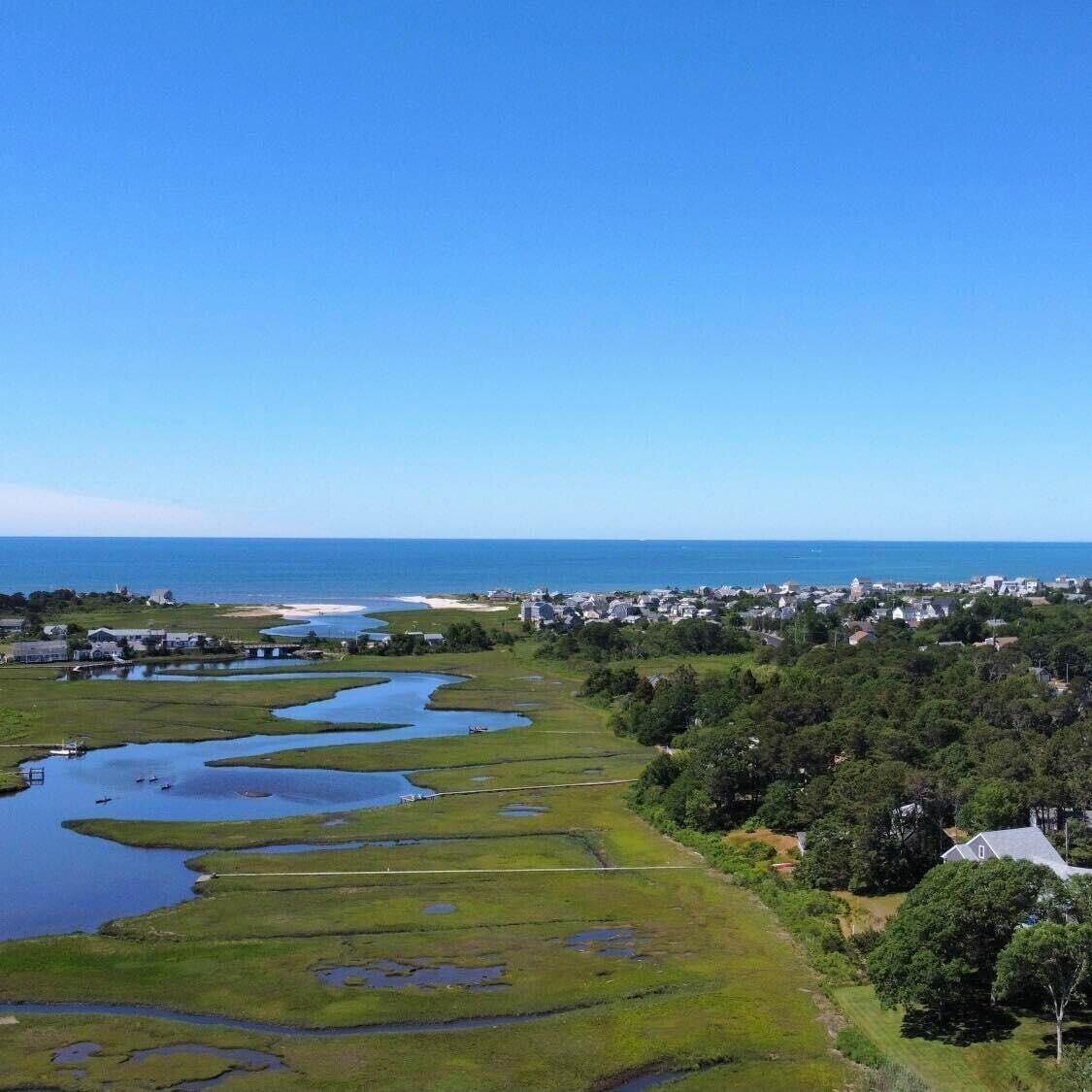 Waterfront! Beautiful river views! Kayaks, paddleboard, porch, fire pit! 