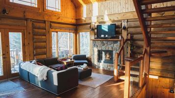 TV, fireplace, books, offices