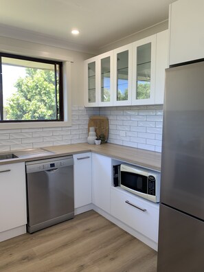 Fridge, microwave, oven, stovetop - Large comfortable house just a stones throw from the beach. Pets welcome! (Culburra Beach)