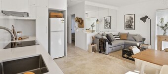Walk to beach from this beautiful one bedroom air conditioned unit.