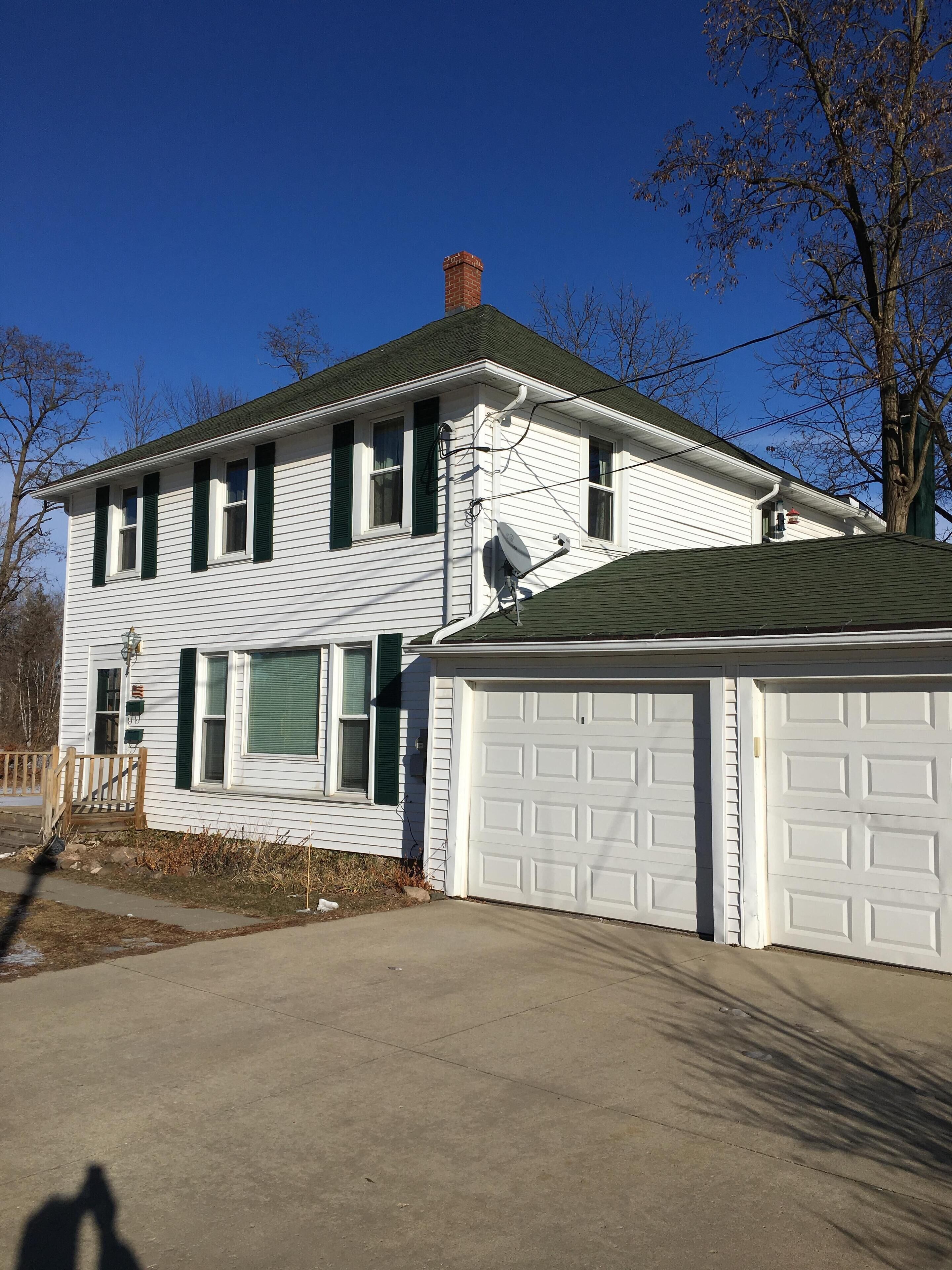 Lower unit of duplex on N. Main St. Shawano next to Huckleberry Harbor @ Channel