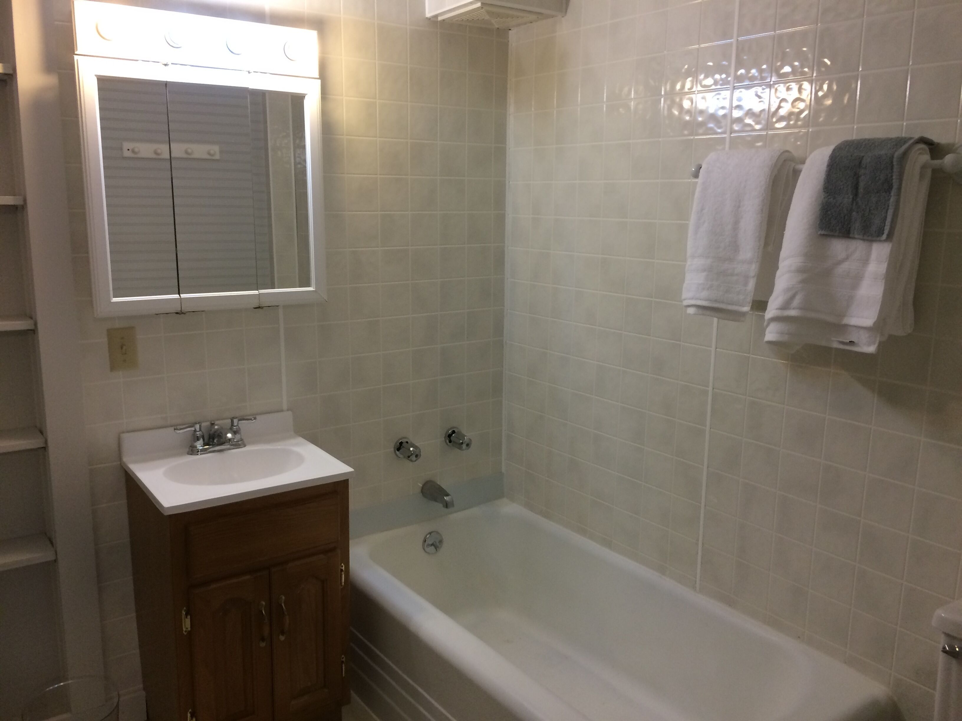 Lower unit of duplex on N. Main St. Shawano next to Huckleberry Harbor @ Channel