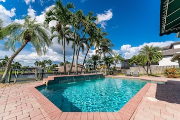 Fabulous heated pool featuring three waterfalls.