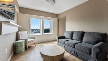 Deluxe Room, 1 Queen Bed with Sofa bed, Ocean View | Living area | 42-inch flat-screen TV with satellite channels, TV