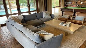 TV, fireplace, books