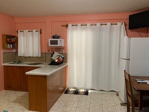 Fridge, microwave, stovetop, coffee/tea maker - Beachfront Condo on Caye Caulker - Steps from the beach and has a pool (Caye Caulker)
