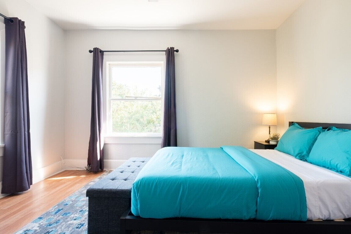 4 bedrooms, blackout drapes, iron/ironing board, WiFi