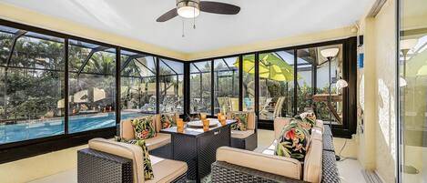 A heated pool, sun loungers