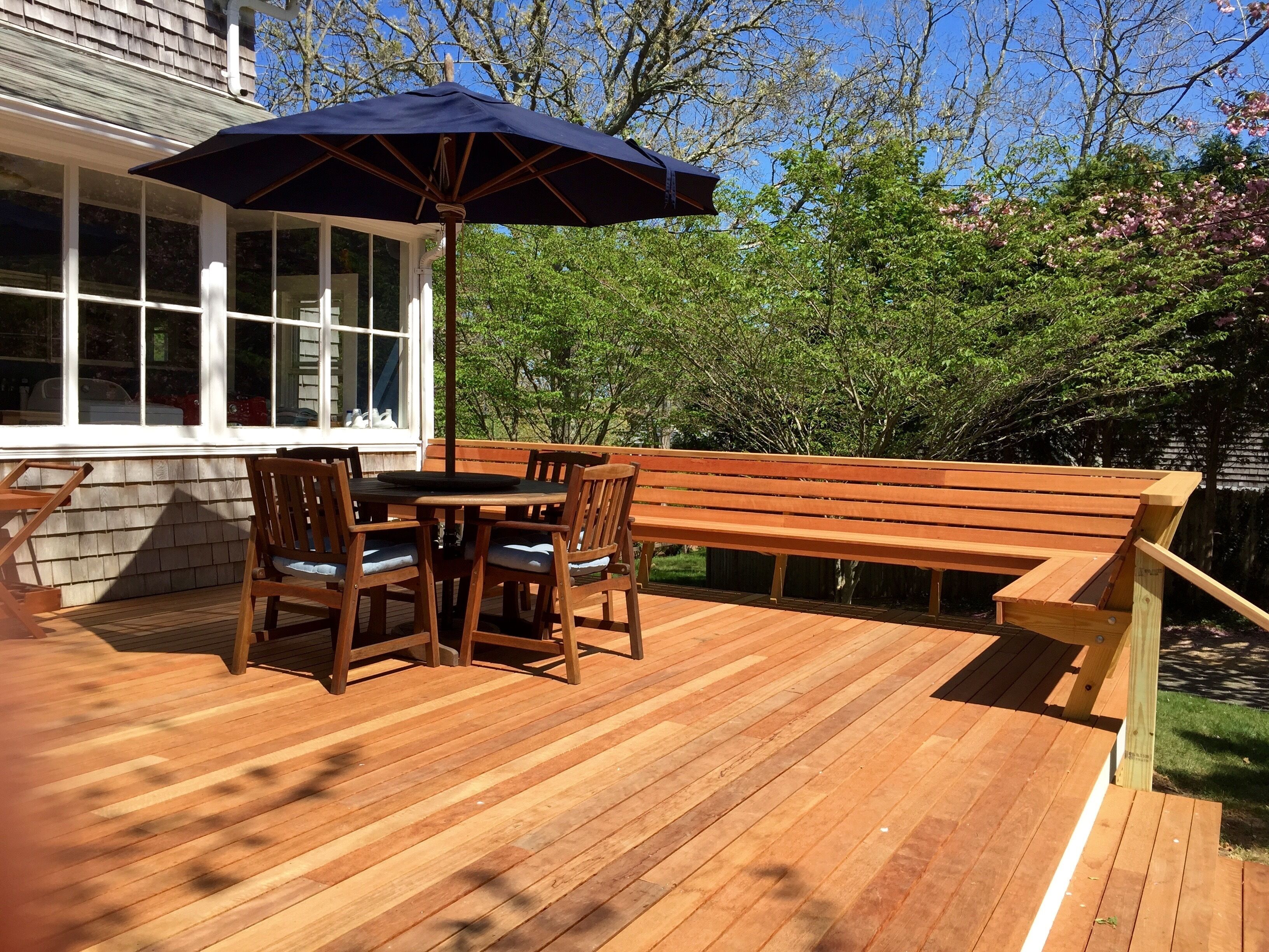 New spacious mahogany deck with grill. Our guests favorite place to be