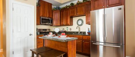 Microwave, dishwasher, coffee/tea maker, cookware/dishes/utensils
