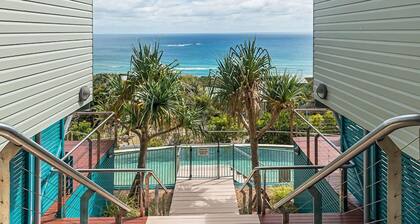 Panoramic ocean and beach views from this beautifully appointed two...