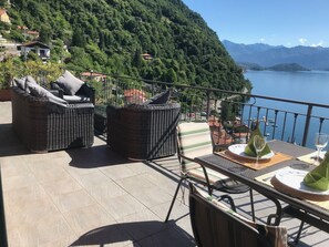 Outdoor dining - Villa Panoramica 180 degree views of Lake Como from the wrap around terrace (Argegno)