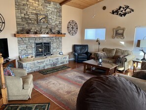 Smart TV, fireplace, DVD player, books