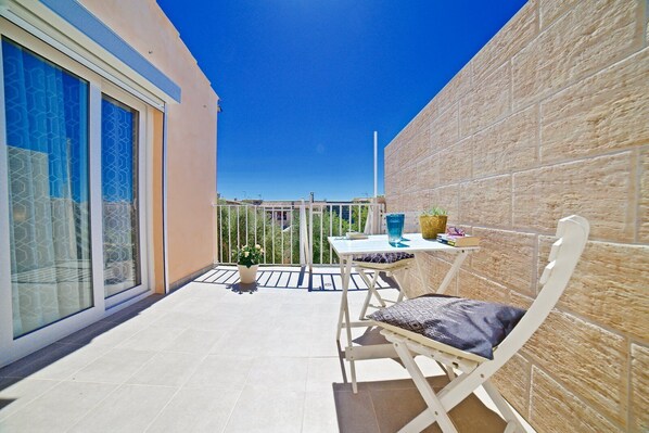 Outdoor dining - CASA YOKO a charming loft located in Ses Salines (Ses Salines)