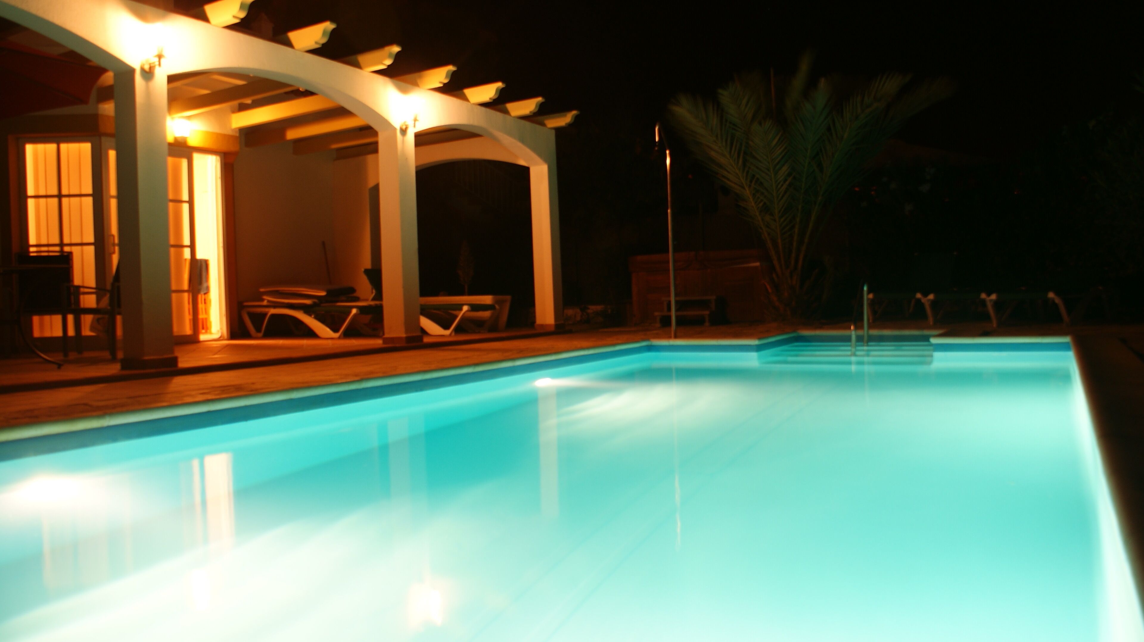 Outdoor pool, a heated pool, sun loungers