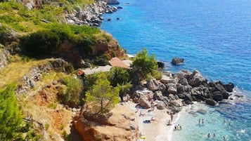Una spiaggia nelle vicinanze, teli da spiaggia