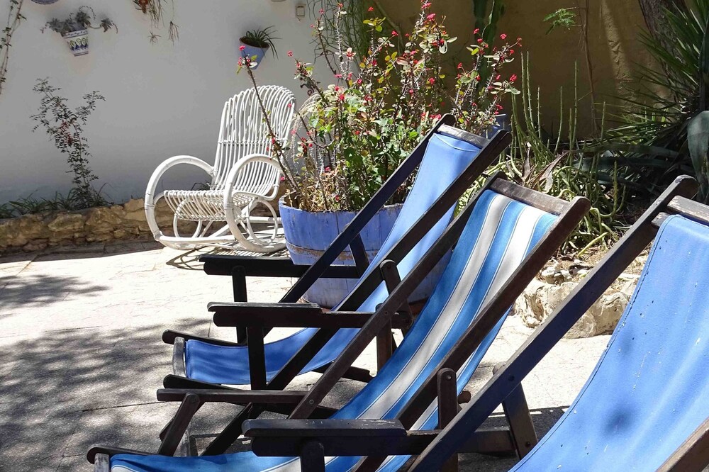 House with patio in the woods 200 meters from the sea