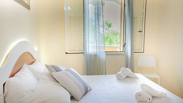 Caja fuerte, sistema de insonorización, wifi gratis y ropa de cama