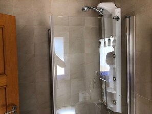 Bathtub, hair dryer, towels