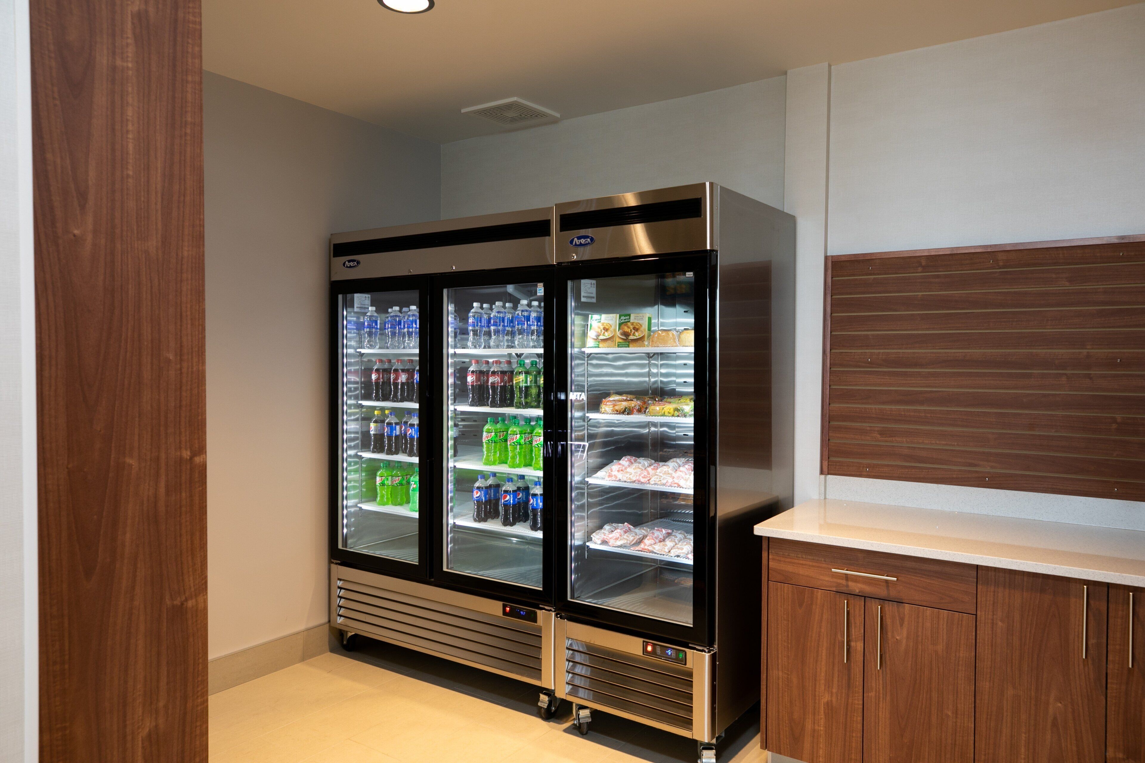 A vending machine with various beverages and snacks.