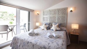 2 slaapkamers, een kluis op de kamer, een strijkplank/strijkijzer