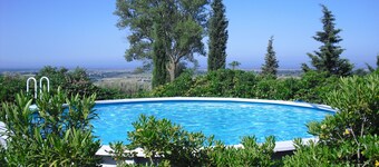 Apartment in a country house in the hills overlooking the sea with a large park and swimming pool