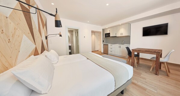 1 chambre, coffres-forts dans les chambres, fer et planche à repasser