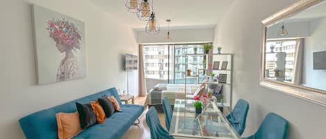 Exclusive Apartment, 1 Bedroom, Non Smoking, City View | Living area | 58-inch Smart TV with cable channels, TV, Netflix