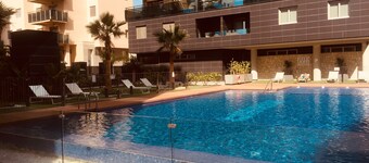 Brand new cozy apartment few steps from the beach, with pool, terrace and WiFi