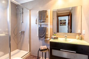 Bathtub, hair dryer, towels