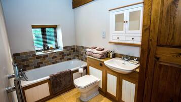 Combined shower/tub, hair dryer, towels, soap