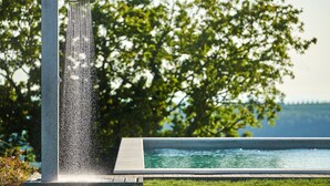 A water feature with a vertical spout, a rectangular pool, and a grassy area. - New Property with Heated Pool near Bike Trails and Truffle Capital of Istria (Oprtalj)