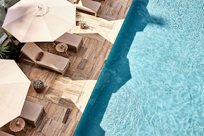 Outdoor pool, open 8:00 AM to 10:00 PM, cabanas (surcharge)
