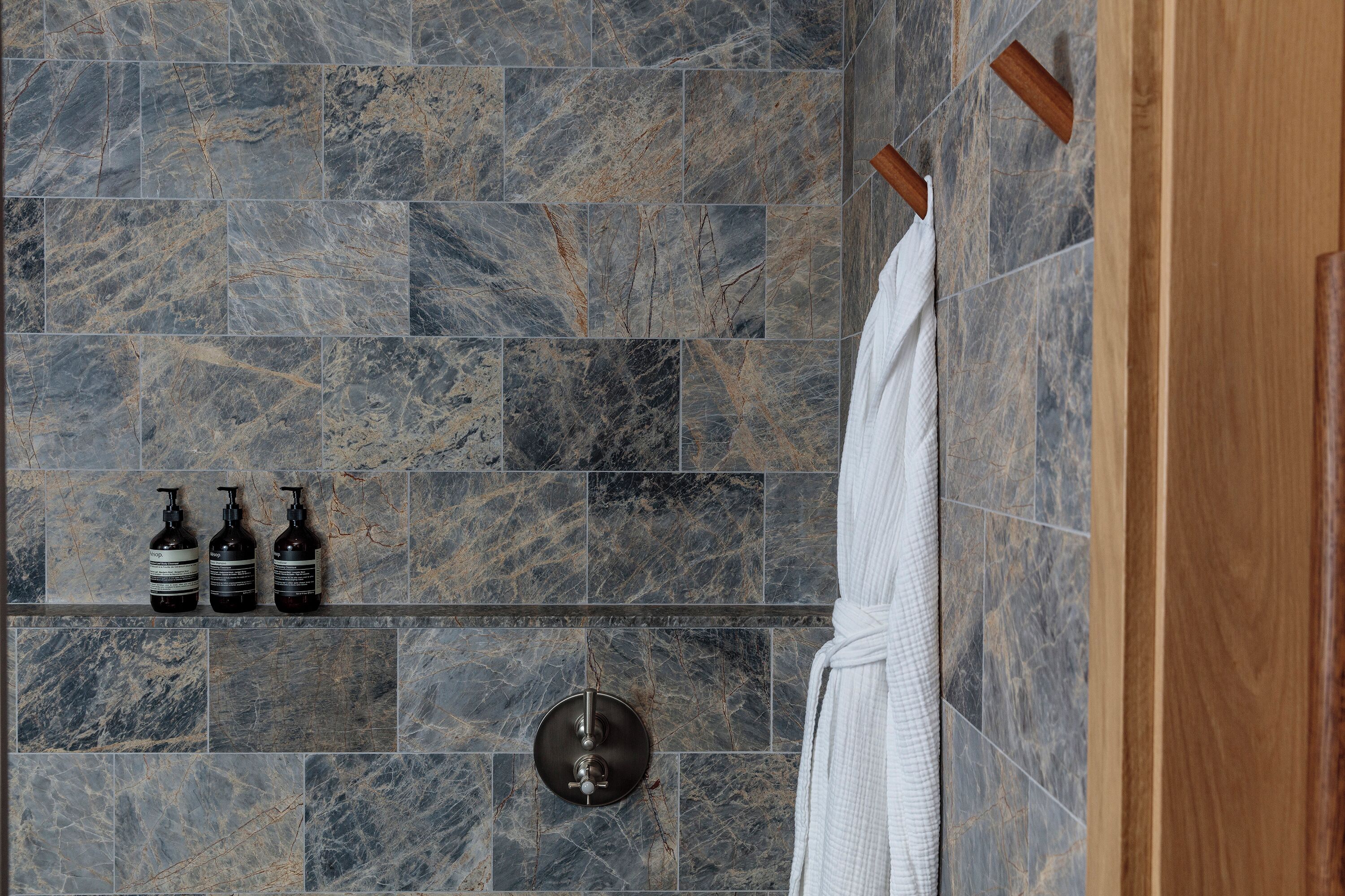 designer toiletries, hair dryer, bathrobes, towels