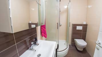 Combined shower/tub, hair dryer, towels, soap