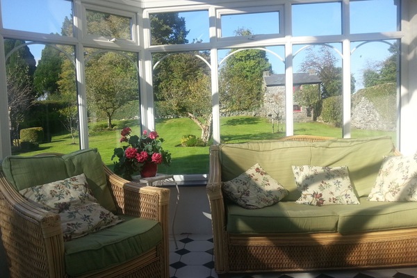 Sunroom for tea in the in all weathers!