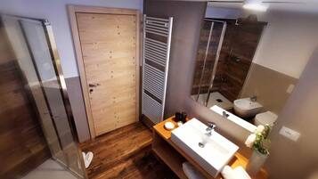 Bathtub, hair dryer, bidet, towels