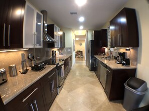 House, 3 Bedrooms (3.5 Bathrooms, Rooftop Patio) | Private kitchen | Full-size fridge, microwave, oven, dishwasher