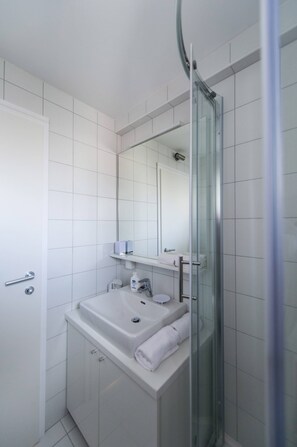 Bathtub, hair dryer, towels